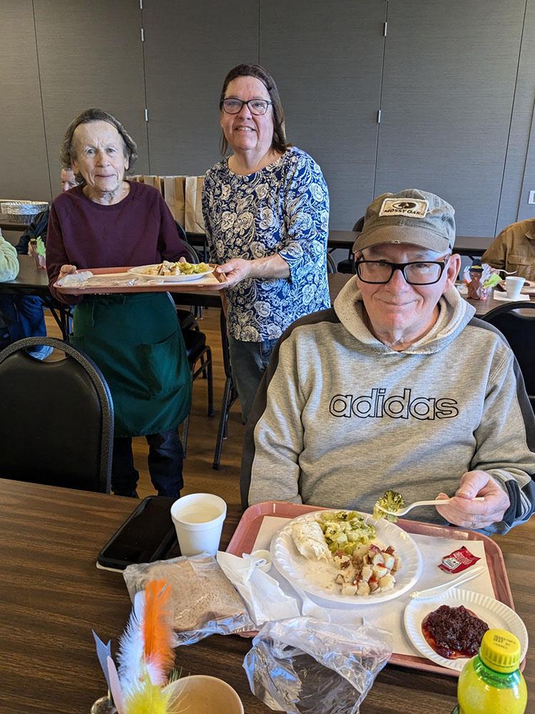 Folks enjoying a hot meal at Griswold Senior Center.